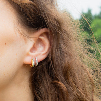 Two-Tone Infinity Huggie Earrings with Sapphires